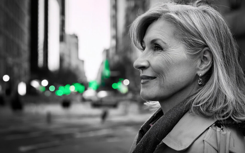 Portrait of older women on a busy intersection