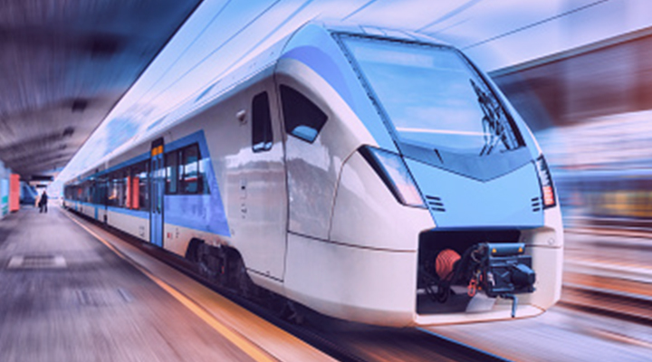 High speed train passing through a station